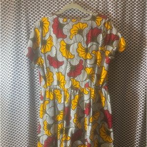 100% Cotton African print dress the length 51inches. Nice summer wedding dress.